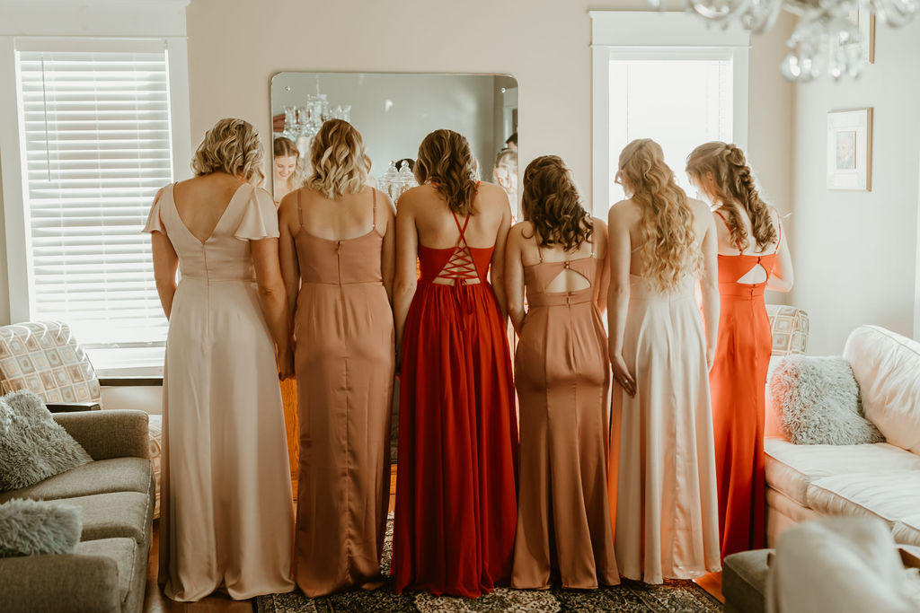 bride first look with her bridesmaids