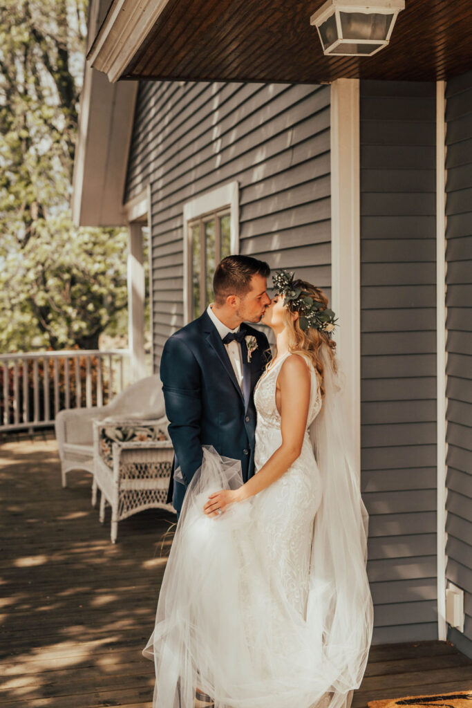 bride and groom photos at their summer barn wedding venue in Michigan