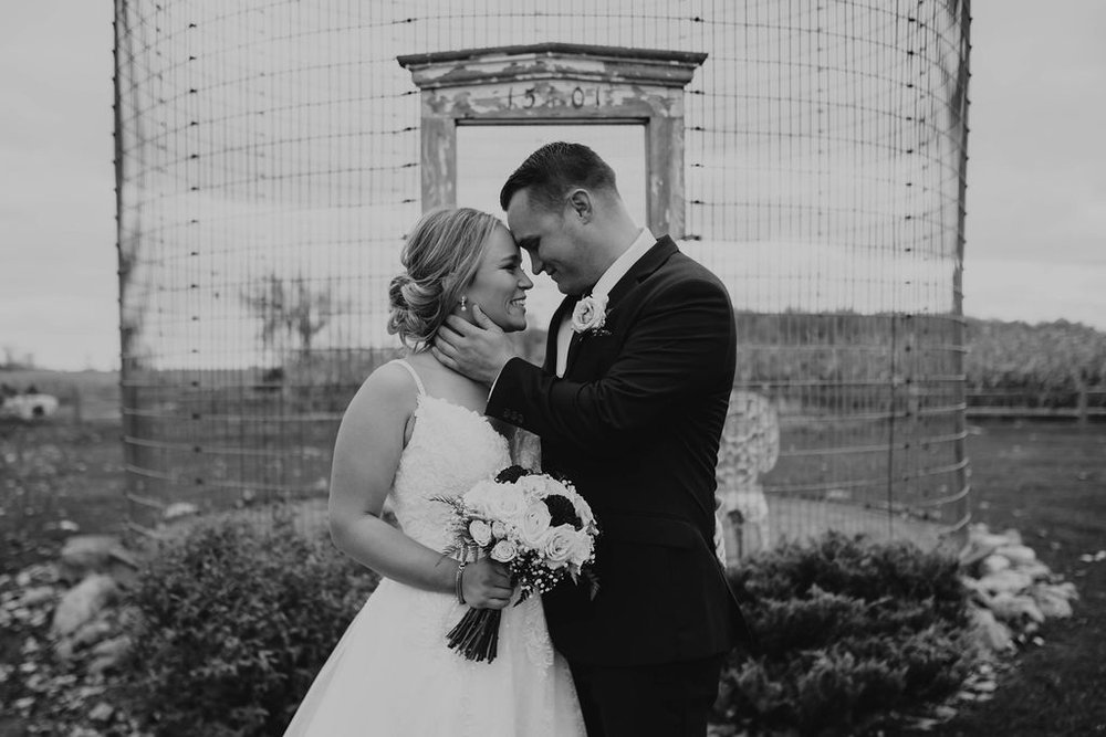 black and white portrait of bride and groom